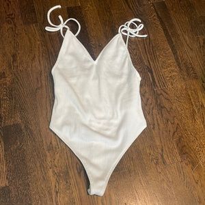 By the Way. White ribbed thong body suit. Size small.